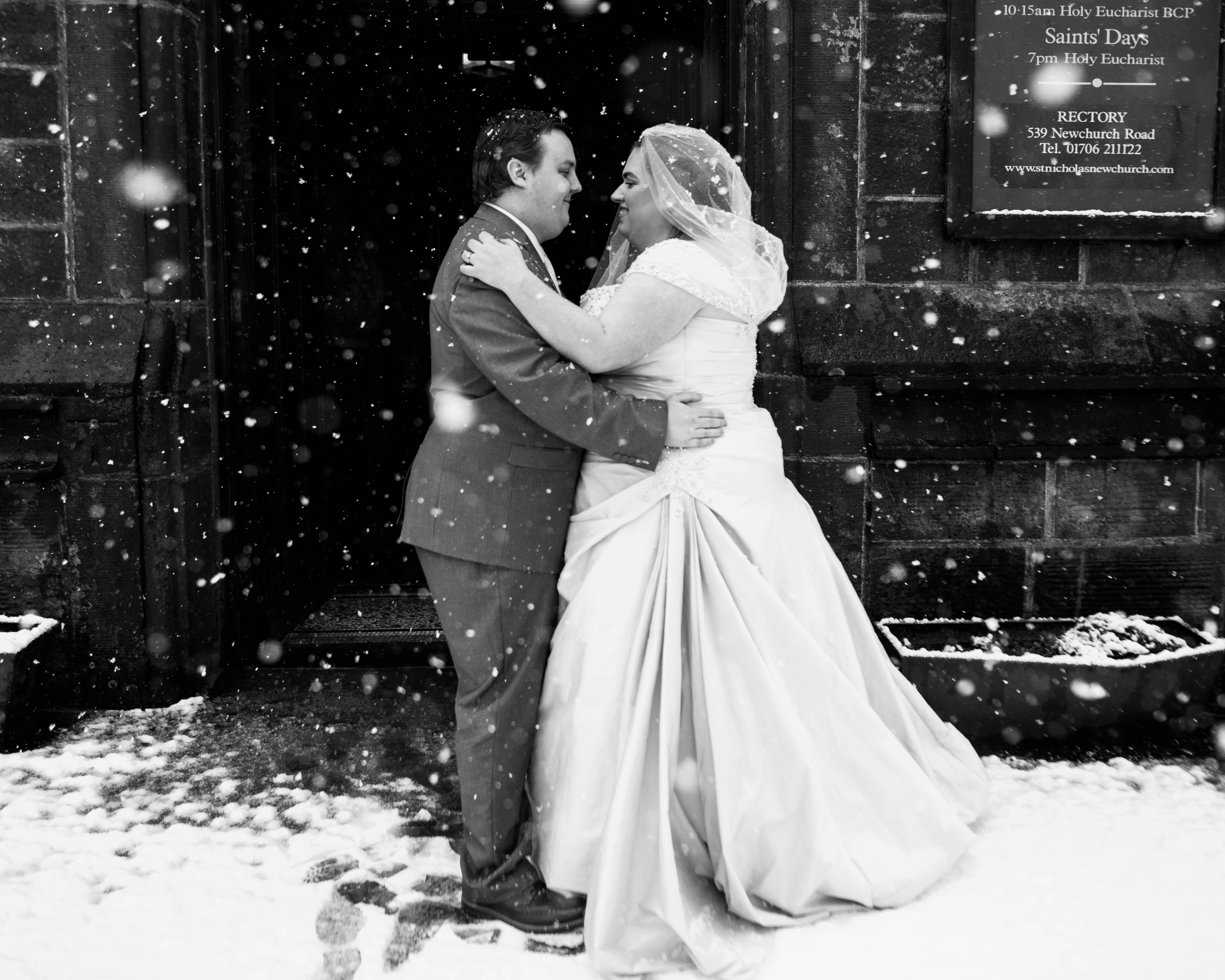 A picture of Liam and his wife on there wedding day